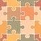 Seamless pattern of puzzles of natural shades