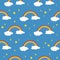 Seamless pattern with rainbow clouds and stars