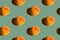 Seamless pattern from ripe juicy yellow red peaches on green slate color background. Creative food poster banner template backdrop