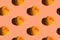 Seamless pattern from ripe juicy yellow red peaches on pink background. Creative food poster banner template backdrop