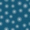 Seamless pattern with round snowflakes. Drawn by hand with brush.