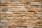 Seamless pattern of sandstone facade on a textured stone wall brick backdrop.