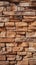 Seamless pattern of sandstone facade on a textured stone wall brick backdrop