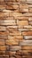 Seamless pattern of sandstone facade on a textured stone wall brick backdrop