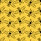 Seamless pattern with silhouettes of black bees on a yellow background. Design is suitable for wallpaper