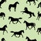 Seamless pattern of silhouettes of horses, black images isolated on a white background.