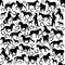 Seamless pattern with silhouettes of horses and horseshoes