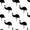 Seamless pattern with silhouettes of ostriches