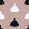 Seamless pattern of silhouettes white and black dresses
