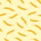 Seamless pattern. Simple vector ears of wheat on beige backgroun