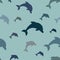 Seamless pattern - simple white jumping dolphins on aqua blue background.