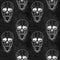 Seamless pattern with skull on grunge background