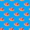 Seamless pattern - slice of water-melon on blue background