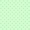 Seamless pattern - small dark dots on a greenish aquamarine background. Moderate graphic texture for design.