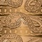 Seamless pattern. Snakes on the background with a snake skin texture. Gold foil print