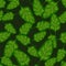 Seamless pattern Spinach salad on dark background. Modern ornament with lettuce