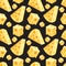 Seamless pattern of square and triangular slices of yellow cheese in vector. Swiss cheese background. Edam slice porous