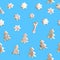 Seamless pattern. Stock New Year illustration with shortbread cookie isolated on a blue background. Baking is sprinkled with sugar