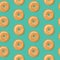 Seamless pattern, top view of fresh bagels with white and brown sesame seeds. Vector illustration.