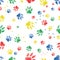 Seamless pattern of traces of dog`s paws.