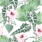 Seamless pattern with tropical leaves and paradise pink hibiscus flowers.