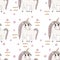 Seamless pattern with Unicorn with long hair with flower