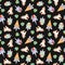 Seamless pattern with unicorns cupcakes