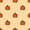 Seamless pattern with vegetarian food - pumpkin on orange background