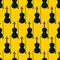 Seamless pattern of violins on yellow background, icon classical musical instruments, vector illustration