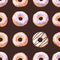 Seamless pattern with watercolor glazed donuts