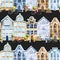 Seamless pattern of watercolor scandinavian houses street