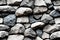 Seamless pattern on weathered, aged rocks, pebbles and stone bricks. 3d illustration