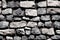 Seamless pattern on weathered, aged rocks, pebbles and stone bricks. 3d illustration