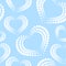 Seamless pattern with white dotted hearts on blue