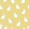 Seamless pattern with white small rabbits on yellow background. Cute bunny decorative farm kitchen print, vector eps 10