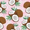 Seamless pattern whole coconut and piece with palm leaves on pink background