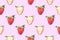 Seamless pattern of whole and halved strawberries with green leaves on a pink background