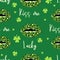 Seamless pattern of woman\\\'s lips with leopard print and lucky charm clover in green colors