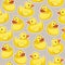 Seamless pattern with yellow ducks.