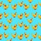 Seamless pattern with yellow ducks with red paws