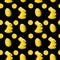 seamless pattern of yellow hares on a black background