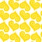 Seamless pattern yellow hearts