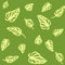 Seamless pattern of yellow leaves Monstera, isolated on green background.