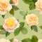 Seamless pattern of yellow roses. Photorealistic roses on a green background in polka dots.