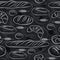 Seamless patterns with different breads, croissant, wheat on black chalkboard. Ideal for printing onto fabric and paper or scrap