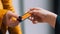 Seamless Payment Experience, Close-up of a Hand Passing Credit Card for Secure Transactions, Generative AI
