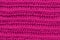 A seamless pink crocheted texture