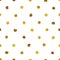 Seamless polka dot golden paint brush strokes pattern.