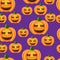 Seamless pumpkins on violet