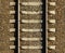 Seamless railroad Pattern, backdrop with space for text. Top view. Shiny iron rails and concrete sleepers, coupled with powerful